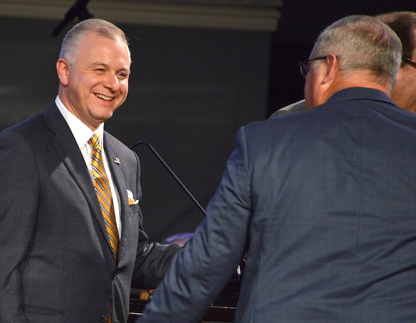 Fayetteville pastor Josh Saefkow receives congratulatory handshakes after he was elected Georgia Baptist Convention president last November. Index/Henry Durand.