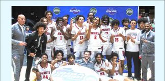 Sandy Creek High School boys basketball team and coaches show off their 2024 state championship title. Photo/Fayette County School System.