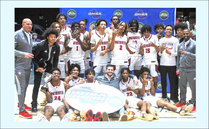 Sandy Creek High School boys basketball team and coaches show off their 2024 state championship title. Photo/Fayette County School System.