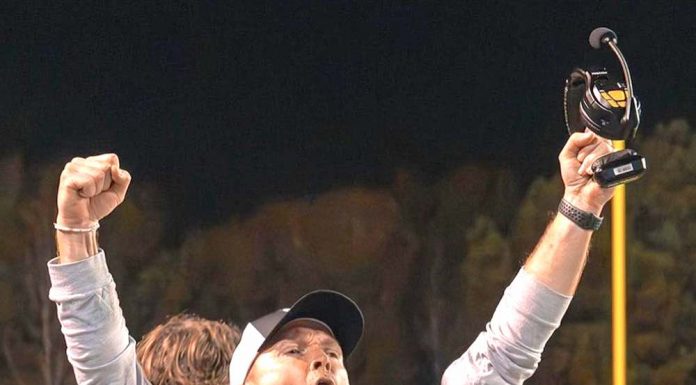 New head football coach David Cooper cheers on his team. Photo/Fayette County School System.