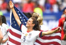 Kelley O'Hara flies the championship flag for her country. Photo/USSoccer.com