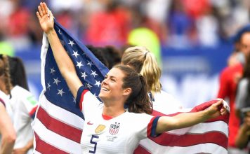 Kelley O'Hara flies the championship flag for her country. Photo/USSoccer.com