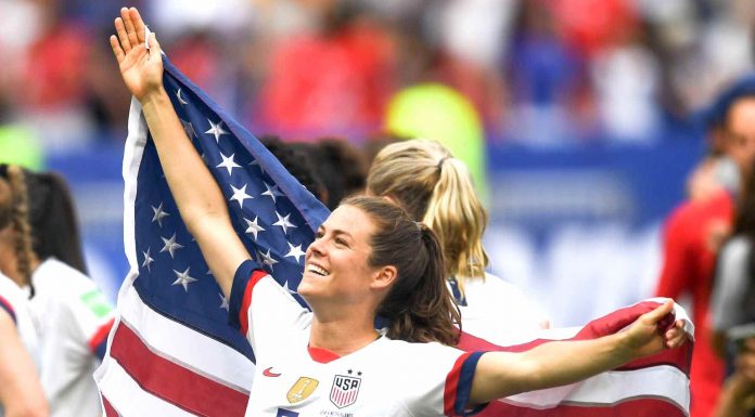 Kelley O'Hara flies the championship flag for her country. Photo/USSoccer.com