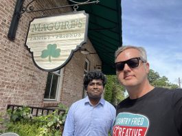 Country Fried Creative owner Joe Domaleski (right) with GSU Data Science Intern Vinay Revanuru in front of Maguire's Irish Pub, one of the subjects of their AI research. Photo/Joe Domaleski
