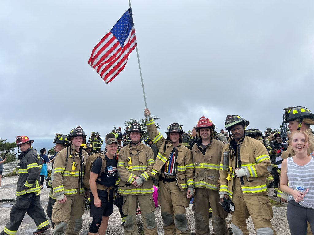 Me (second from left) with my son-in-law Connor McKinlay (third from left) and members of the Fayette County Fire Department atop Stone Mountain for a 9/11 Memorial Event. Photo/Joe Domaleski
