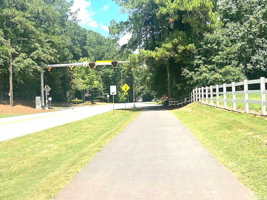 A cart path view of the new signal crossing for golf carts and pedestrians. Photo/Fayette County