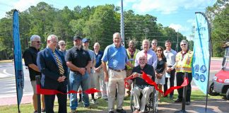 Fayette County officials commemorate the completion of a roundabout and cart path extension on Redwine Road . Photo/Fayette County.