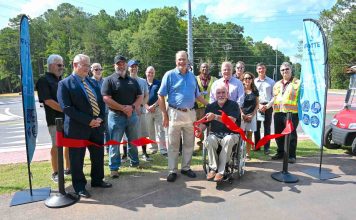 Fayette County officials commemorate the completion of a roundabout and cart path extension on Redwine Road . Photo/Fayette County.