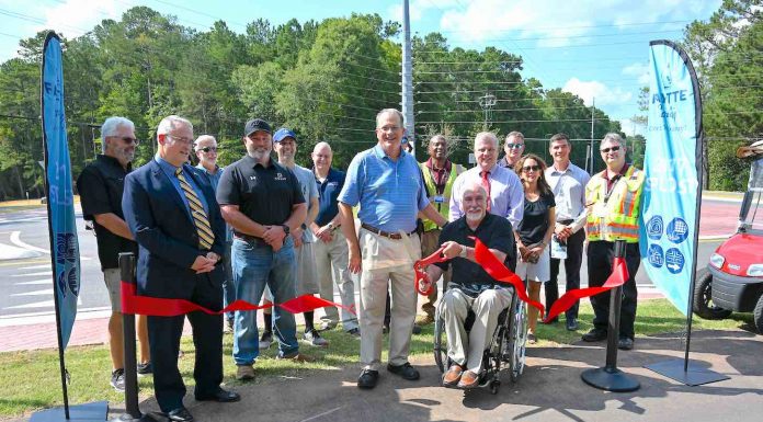 Fayette County officials commemorate the completion of a roundabout and cart path extension on Redwine Road . Photo/Fayette County.