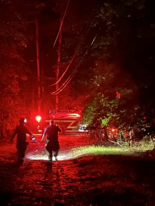 Fayette County Firefighters E. Moore & Frazier respond with Quint 2 at my house. We had power lines down on my car during the storm on the evening of July 30, 2024. Photo/Joe Domaleski