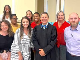 Fayette State Court Judge Jason Thompson (center in black robe) and the DUI Court team observe National Recovery Month during September. Photo/Submitted.