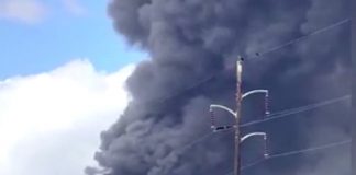 Plume of smoke from Biolab fire seen from I-20 Sunday.