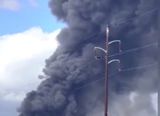 Plume of smoke from Biolab fire seen from I-20 Sunday.