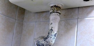 Lead pipe below a wash basin. Photo/Shutterstock.