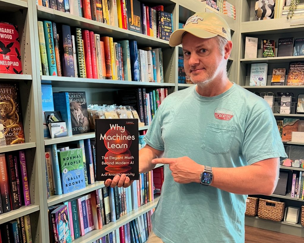 Yours truly holding a copy of the excellent book “Why Machines Learn The Elegant Math Behind Modern AI” by Anil Ananthaswamy. Purchased at my local bookstore — Scholar & Scribe in Fayetteville/Trilith. Photo/Joe Domaleski