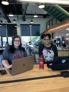 CFC Web Manager Hollie Holder (left) works with Sandy Creek student and WBL Intern Anaya Cherry. Photo/Joe Domaleski